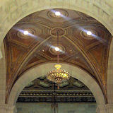 Lower ornate ceiling, chandelier